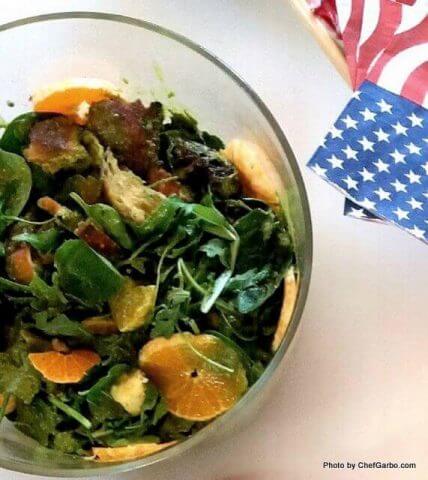 Mixed Green Salad with Sliced Oranges and Torn Bread Croutons