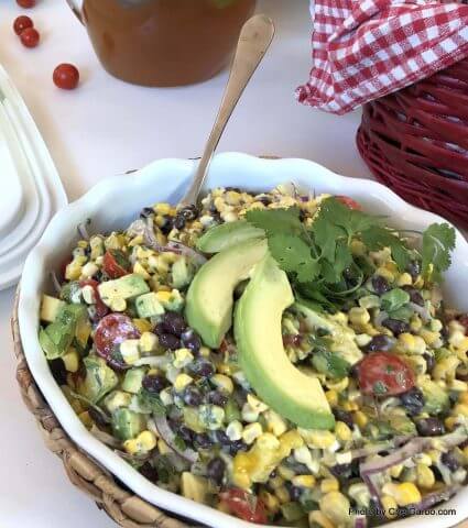 Corn Salad with Tomatoes, Green Bell Peppers and Sliced Avocado